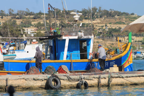 Mending fishing nets